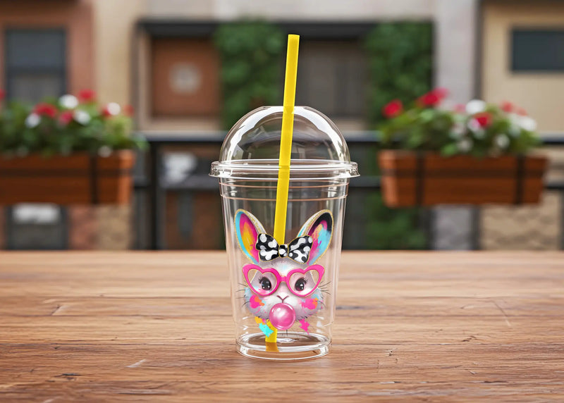 UV DTF Sticker of rabbit face on a plastic cup with straw