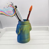 Colorful 3d printed jumper pen pot shaped like a sweater with blue and green gradient hues for desk organization