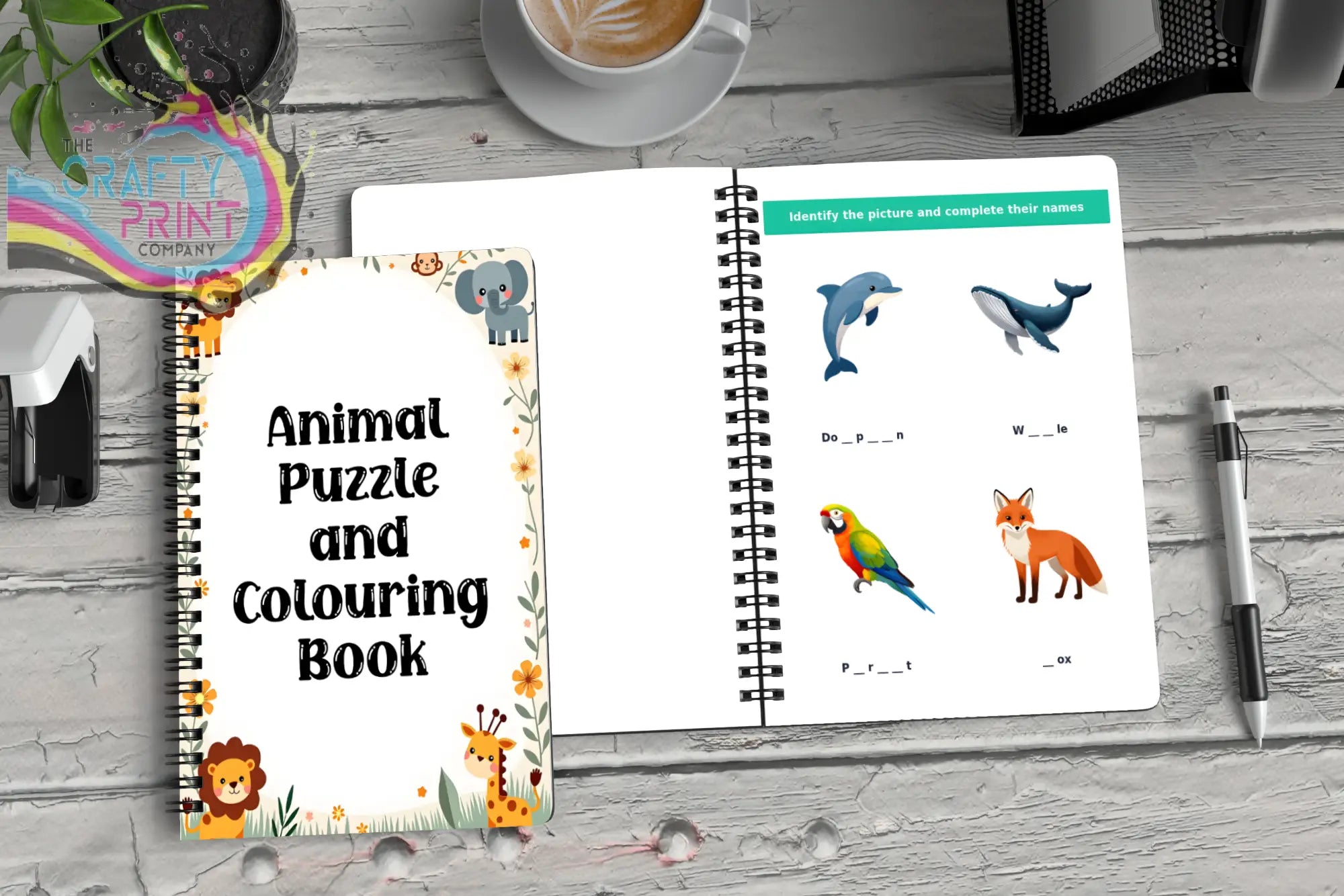 White spiral-bound animal puzzle book for kids with colorful cartoon lions elephants giraffes dolphin and foxes pages activity book