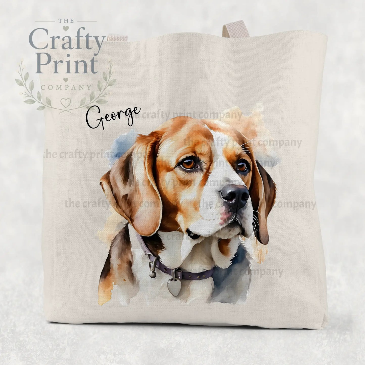 Beige canvas tote bag featuring a beagle watercolour cotton illustration of george with brown and white fur wearing a collar