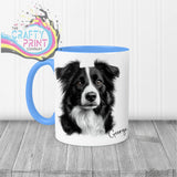 White ceramic border collie mug with blue handle and interior featuring detailed black and white collie drawing
