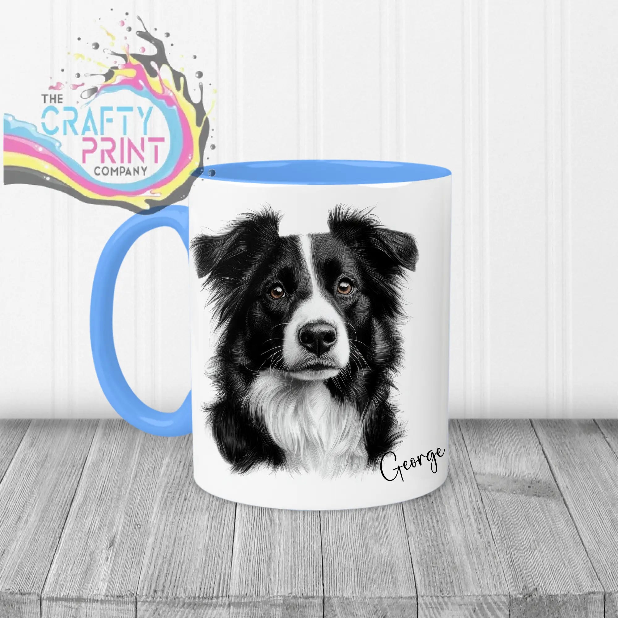 White ceramic border collie mug with blue handle and interior featuring detailed black and white collie drawing