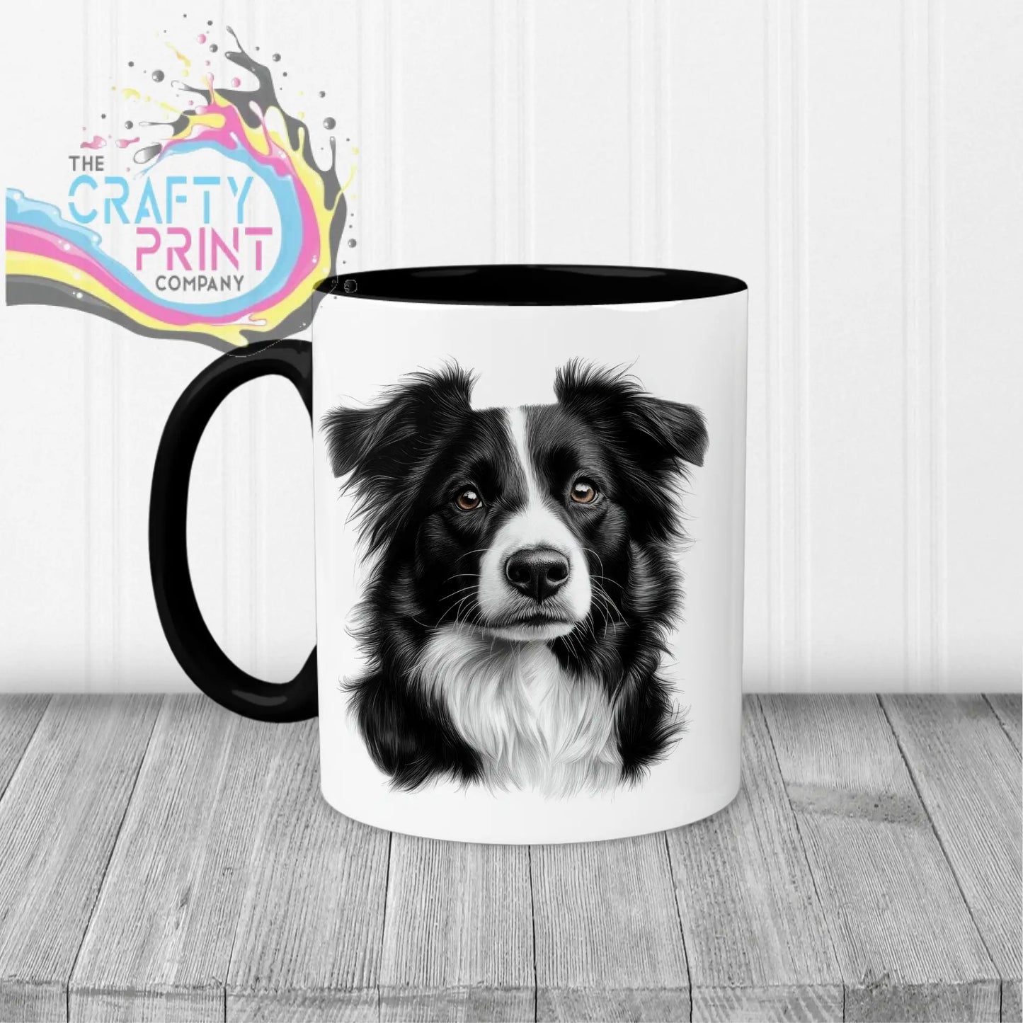 White ceramic border collie mug with black handle and interior featuring a detailed black and white collie drawing