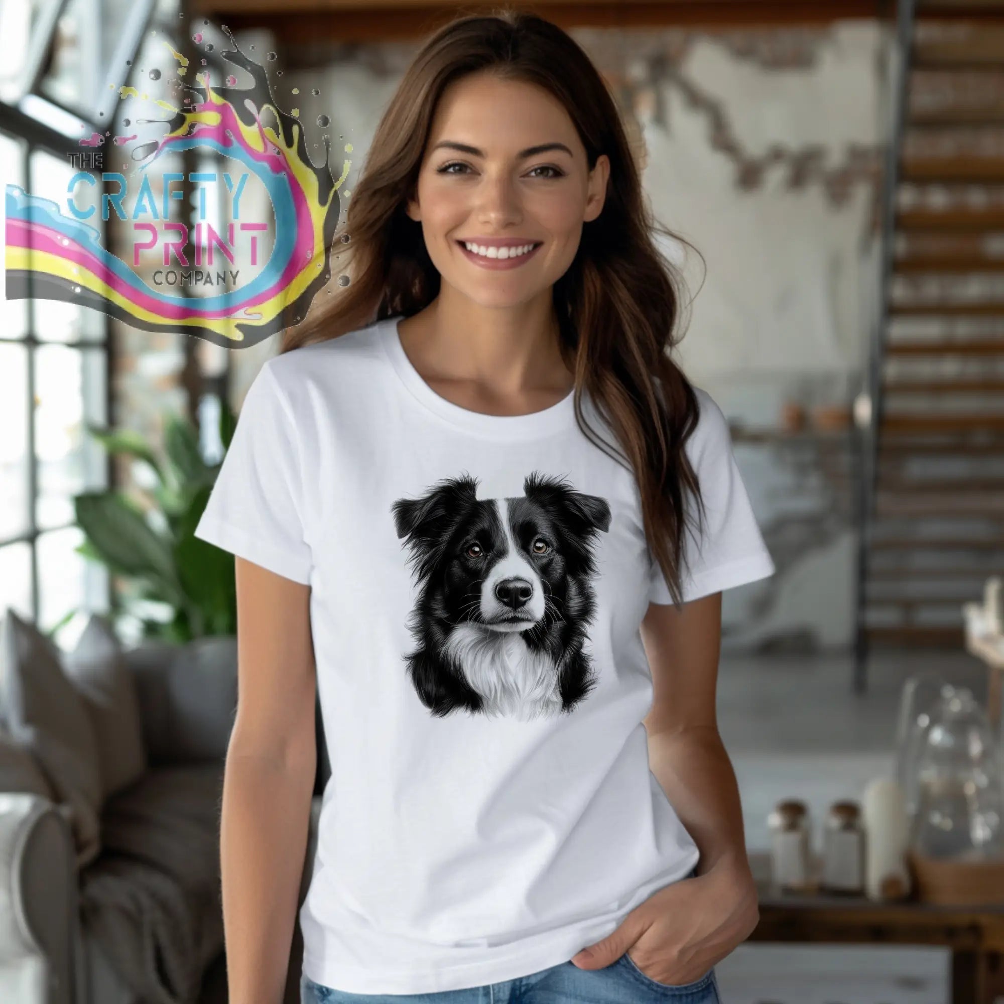 White cotton t-shirt featuring a detailed black and white border collie pencil drawing on the front