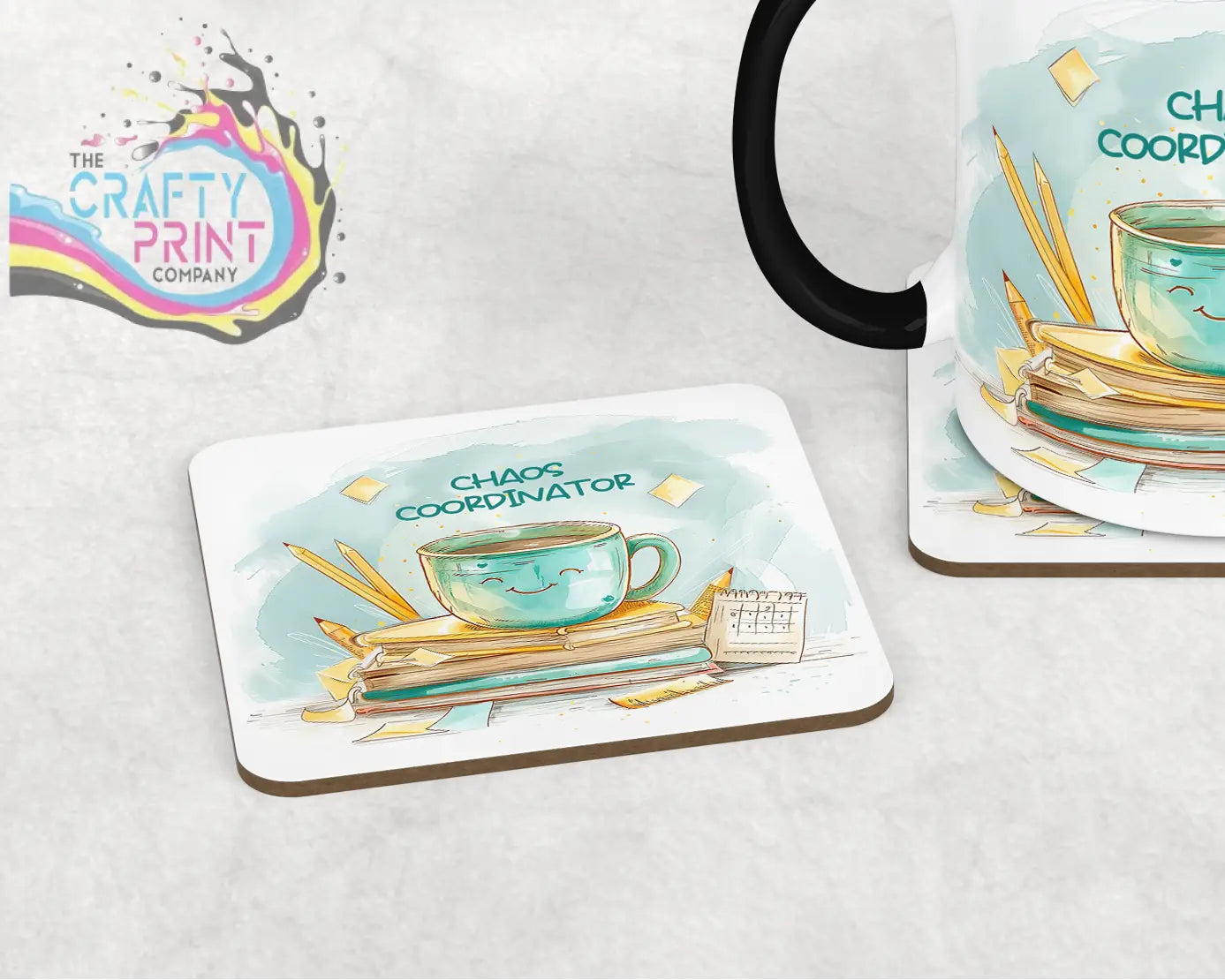 White rectangular chaos coordinator coaster with teal smiling teacup on books and pencils labeled chaos coordinator
