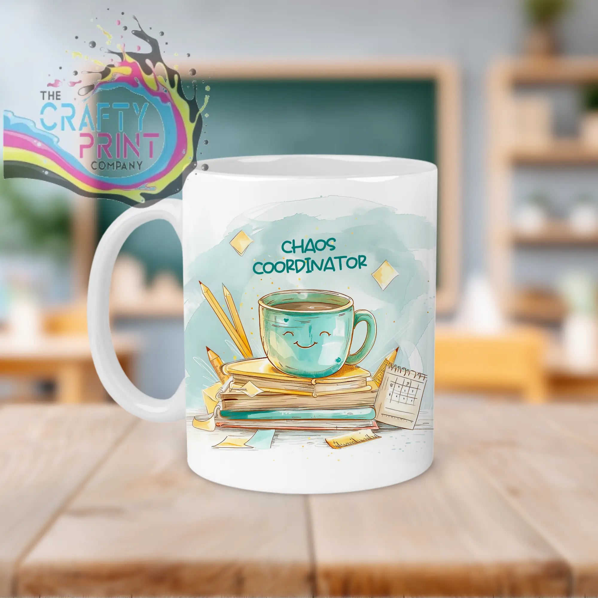 White ceramic chaos coordinator mug with watercolor teal coffee cup and books design for coordinator teacher mug