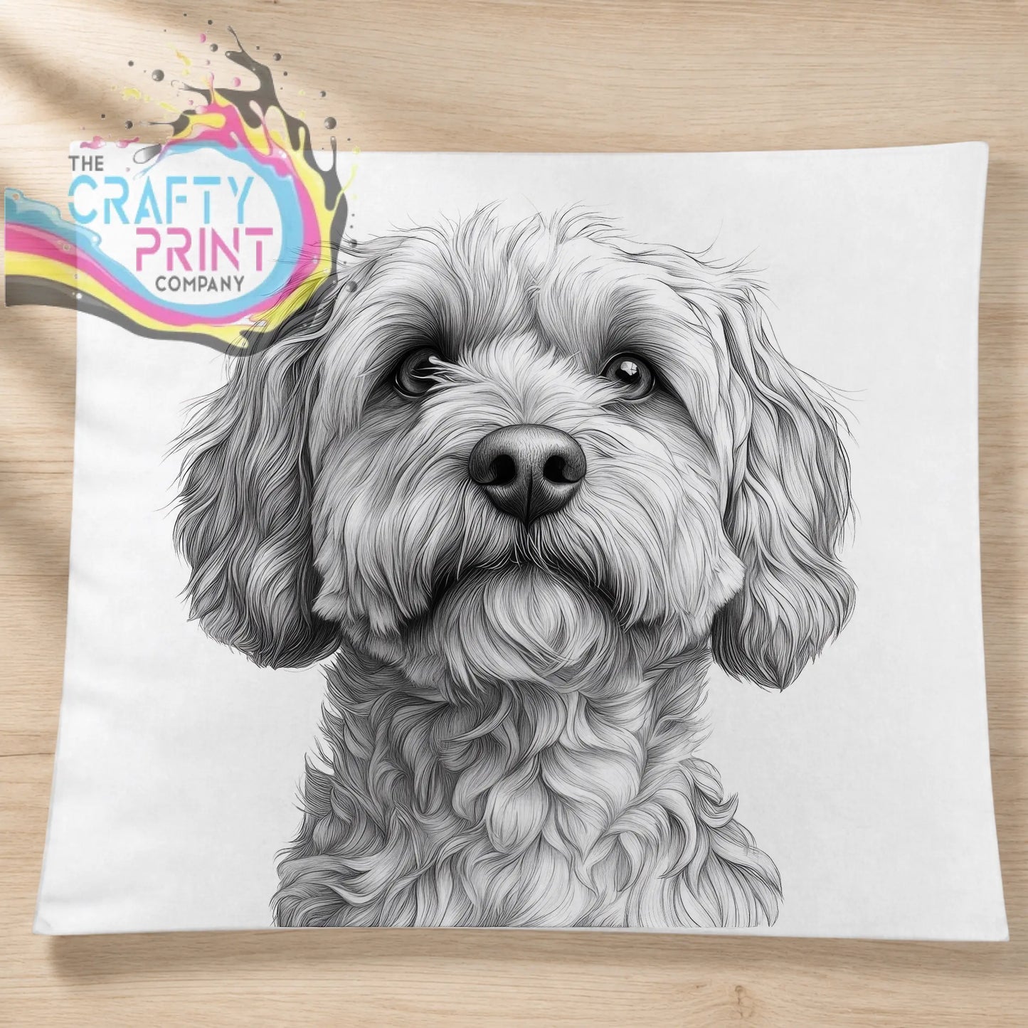 White pillow featuring a detailed black and white cockapoo pencil drawing cushion with fluffy curly hair