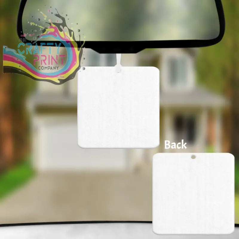 White square car air freshener hanging from rearview mirror with fragrance bottle for custom car air freshener design