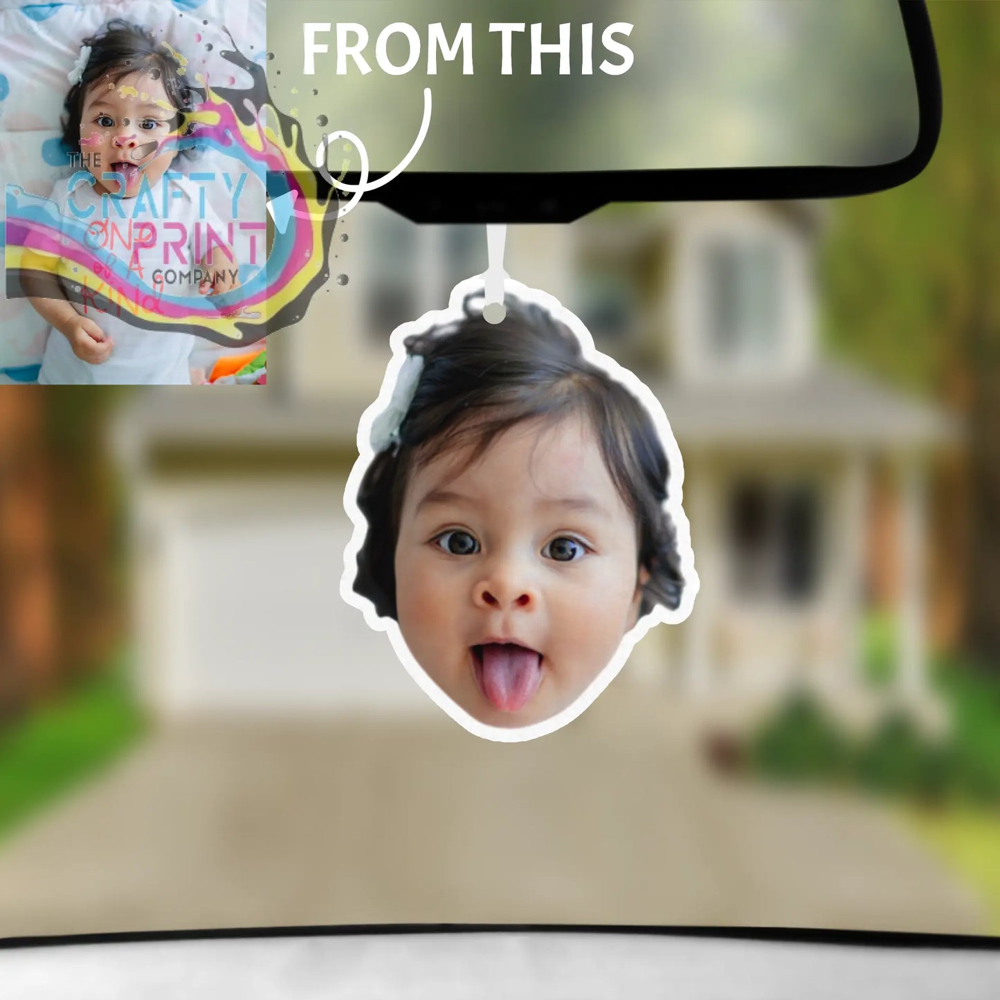 Personalized contour cut car air freshener shaped like a child’s face with dark hair bright eyes and white outline border