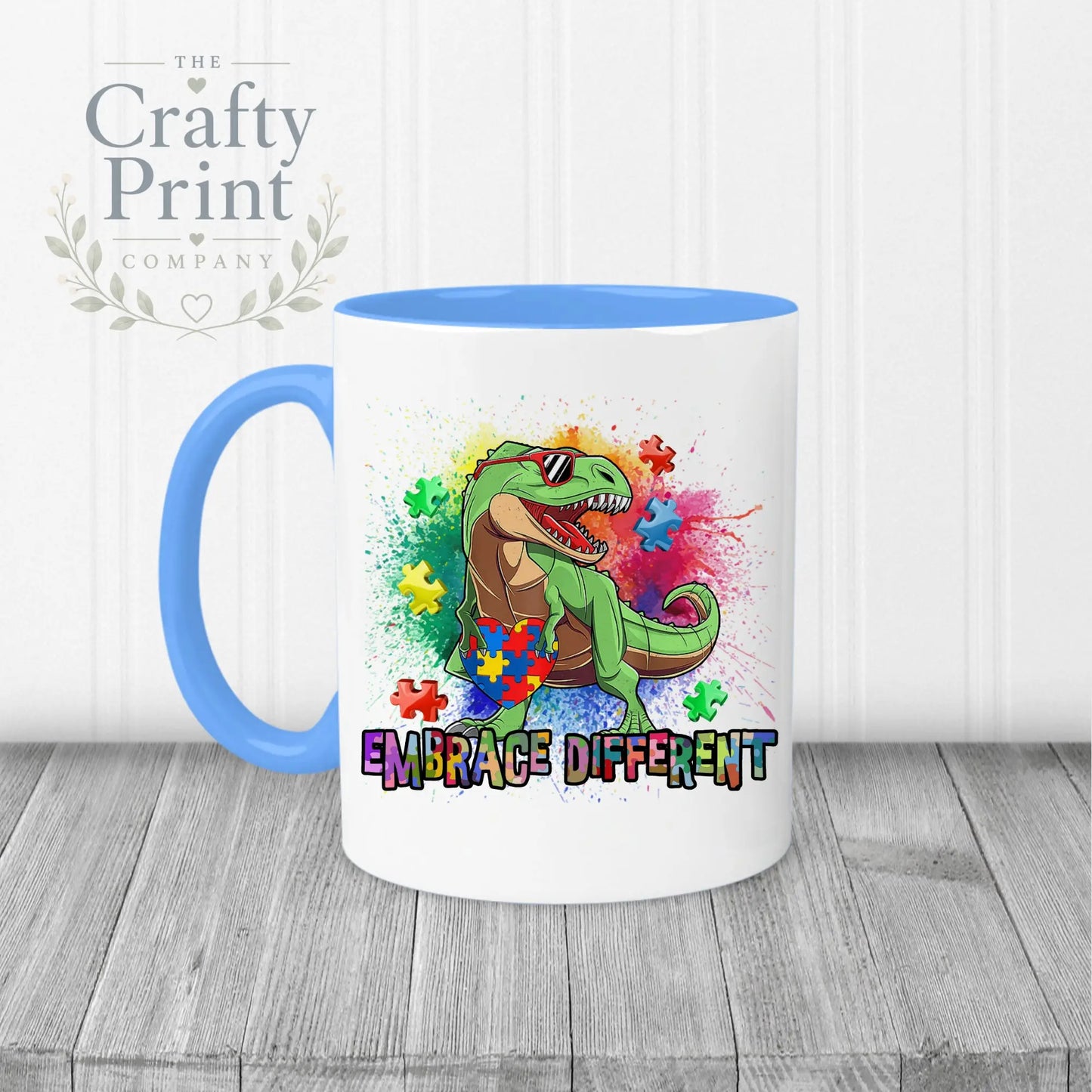 Embrace Different Autism Dinosaur Mug - Blue Handle & Inner