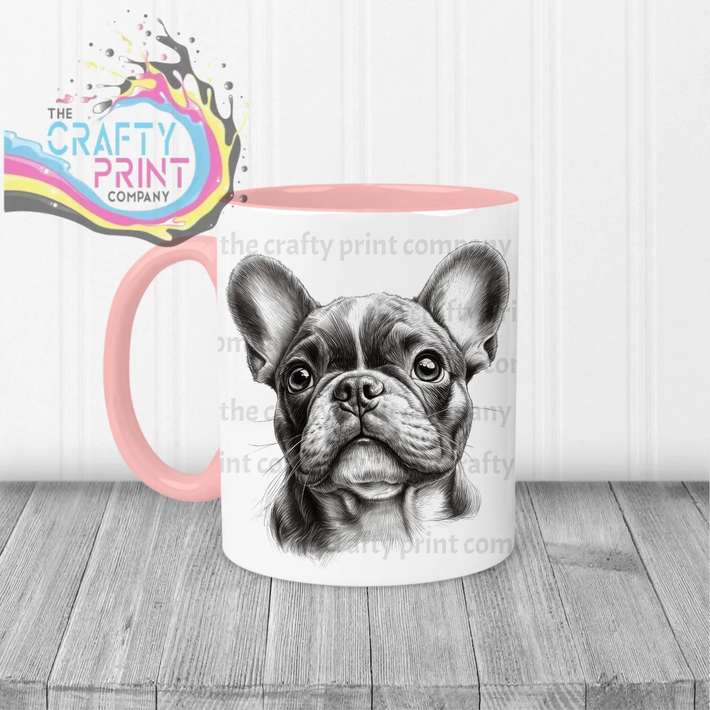 White ceramic french bulldog pencil drawing mug with pink handle and interior featuring detailed french bulldog face