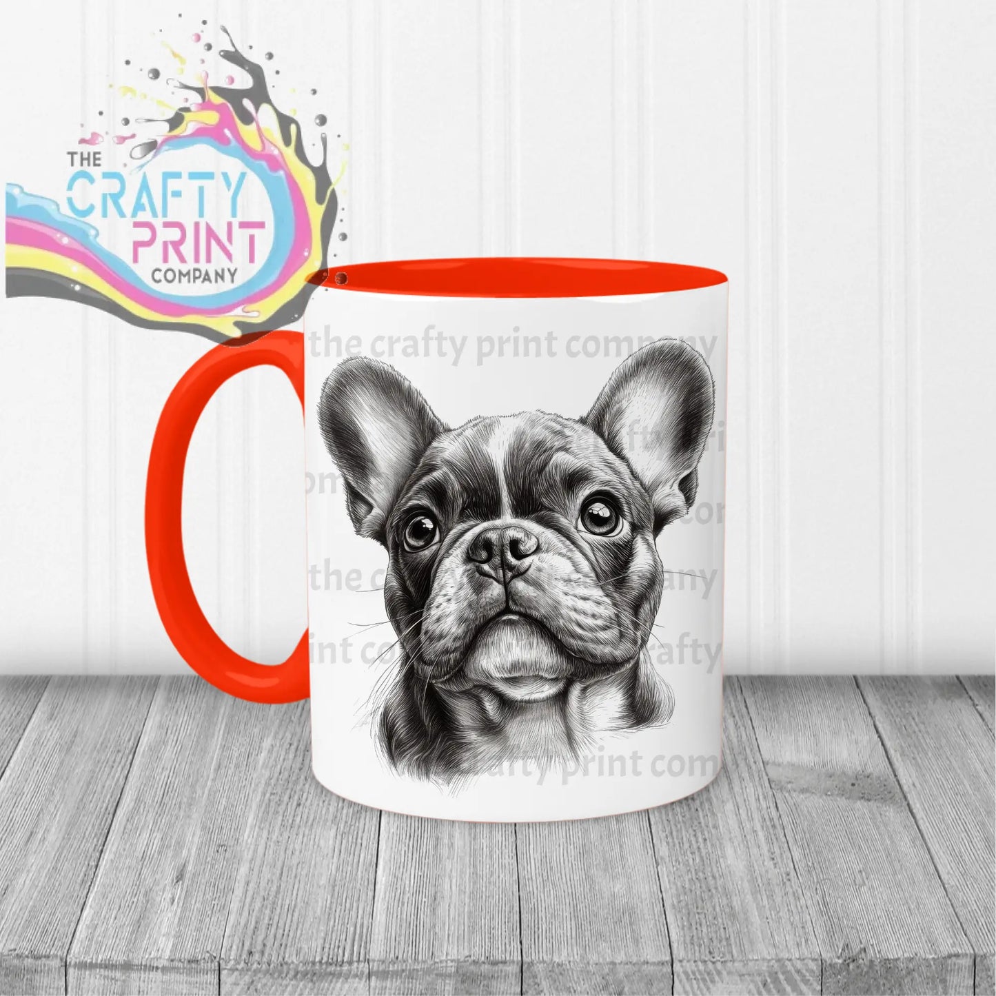 White ceramic mug with vibrant orange handle and interior featuring a detailed french bulldog pencil drawing face