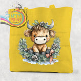 Yellow canvas cotton tote bag featuring a highland cow wreath with silver horns brown fur and pink bow design