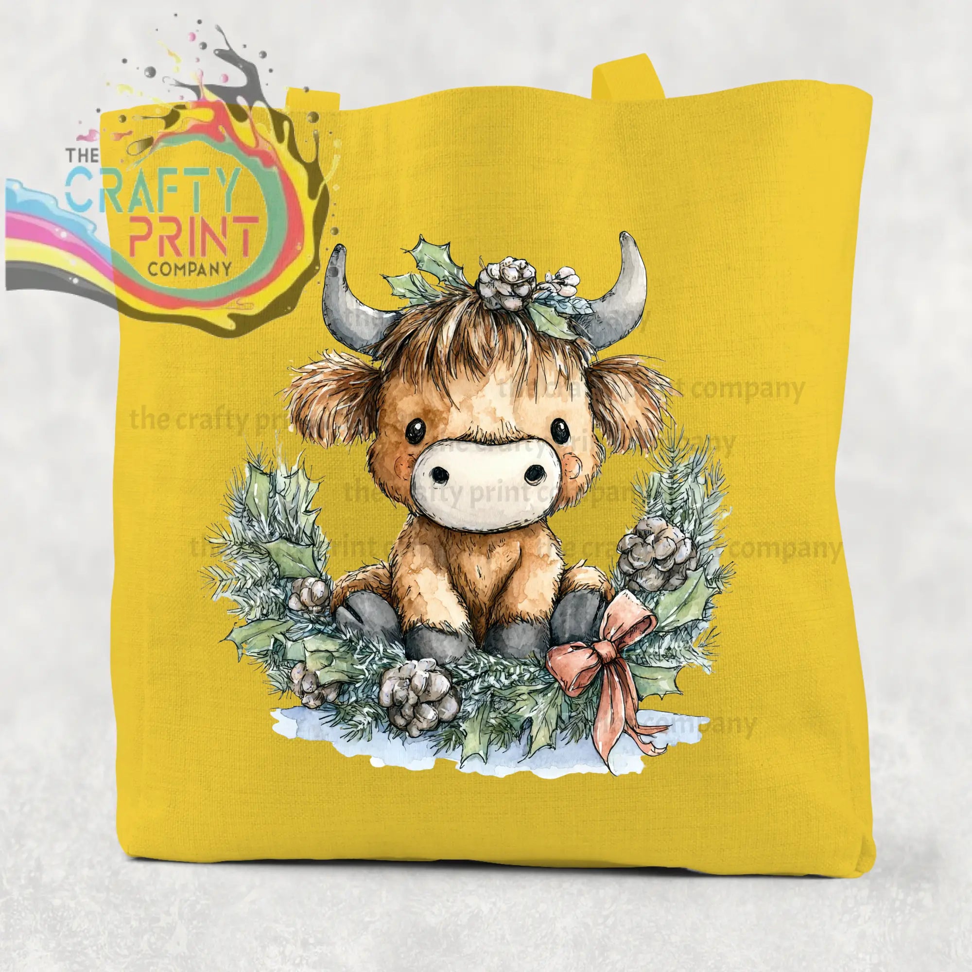 Yellow canvas cotton tote bag featuring a highland cow wreath with silver horns brown fur and pink bow design