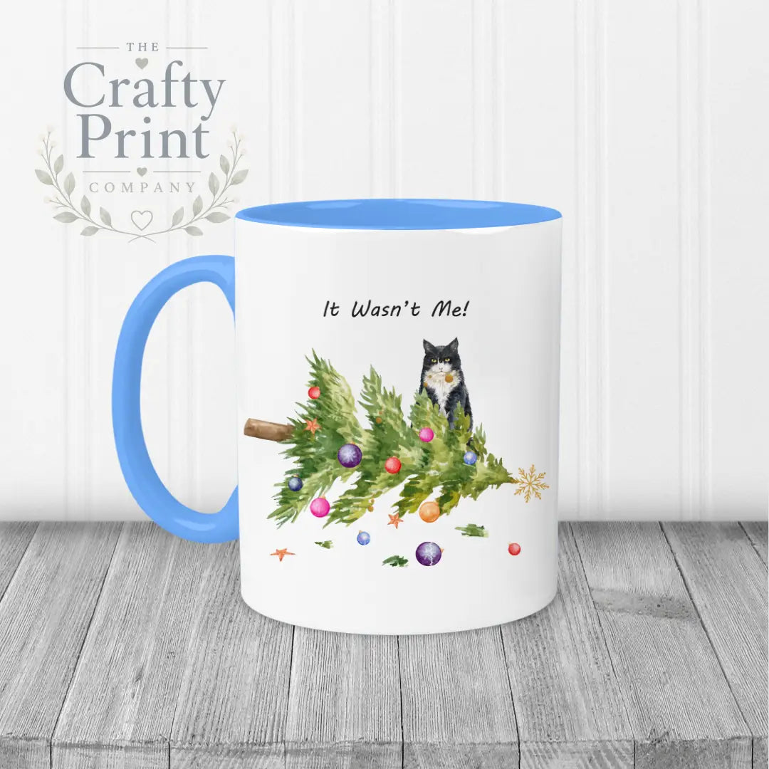 It wasn’t me Christmas Tree Cat Mug - Blue Handle & Inner