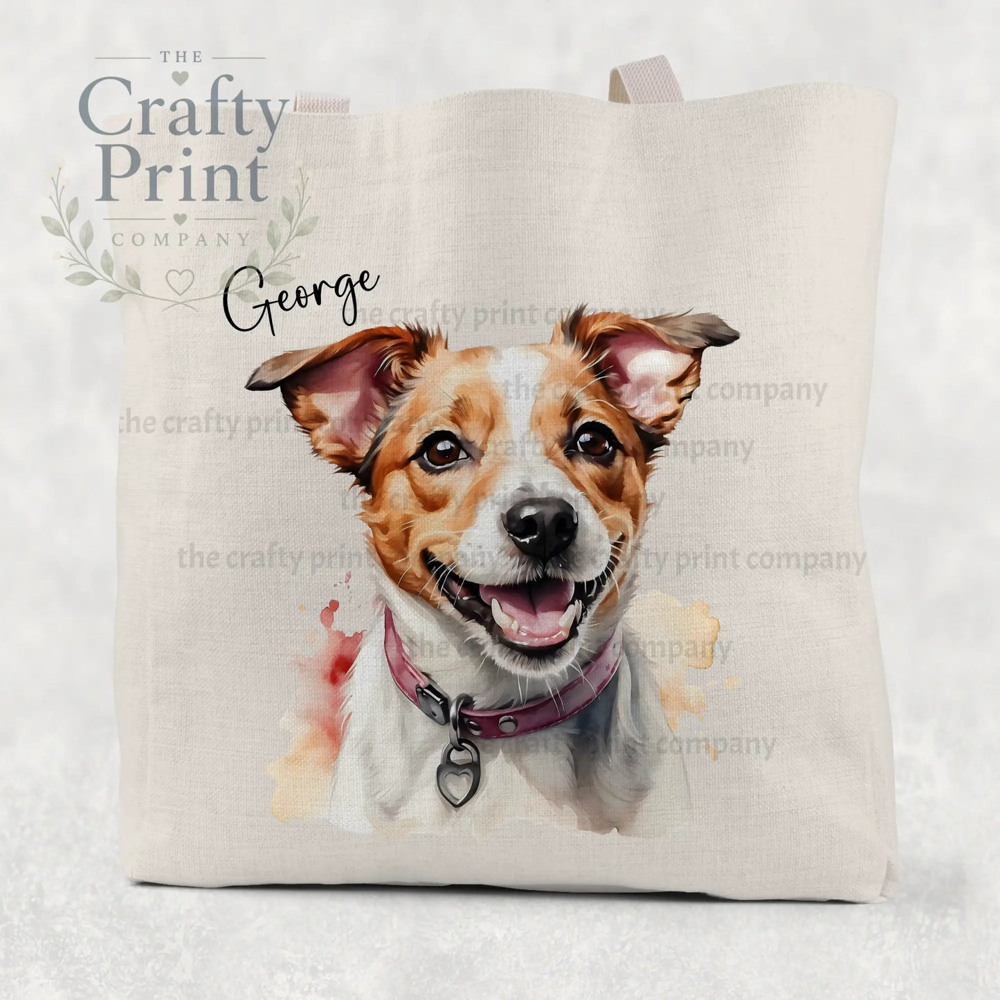 Beige cotton tote bag featuring a jack russell watercolour illustration of george with a purple collar and heart tag