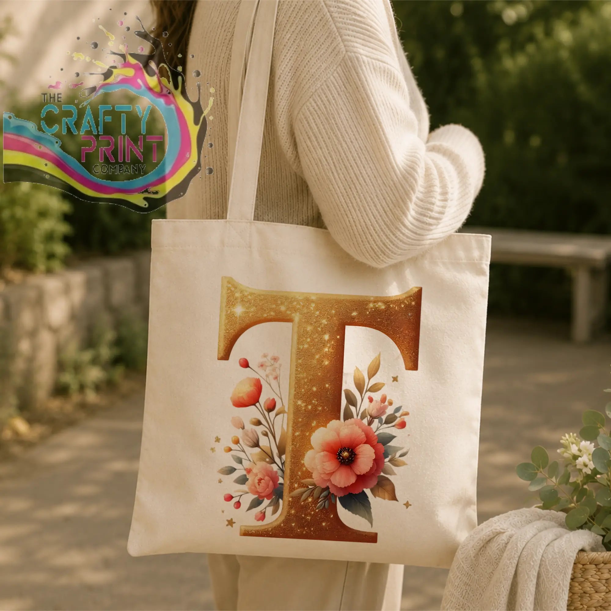 Cream canvas tote bag with gold glitter initial t and soft pink floral design personalized reusable tote bag