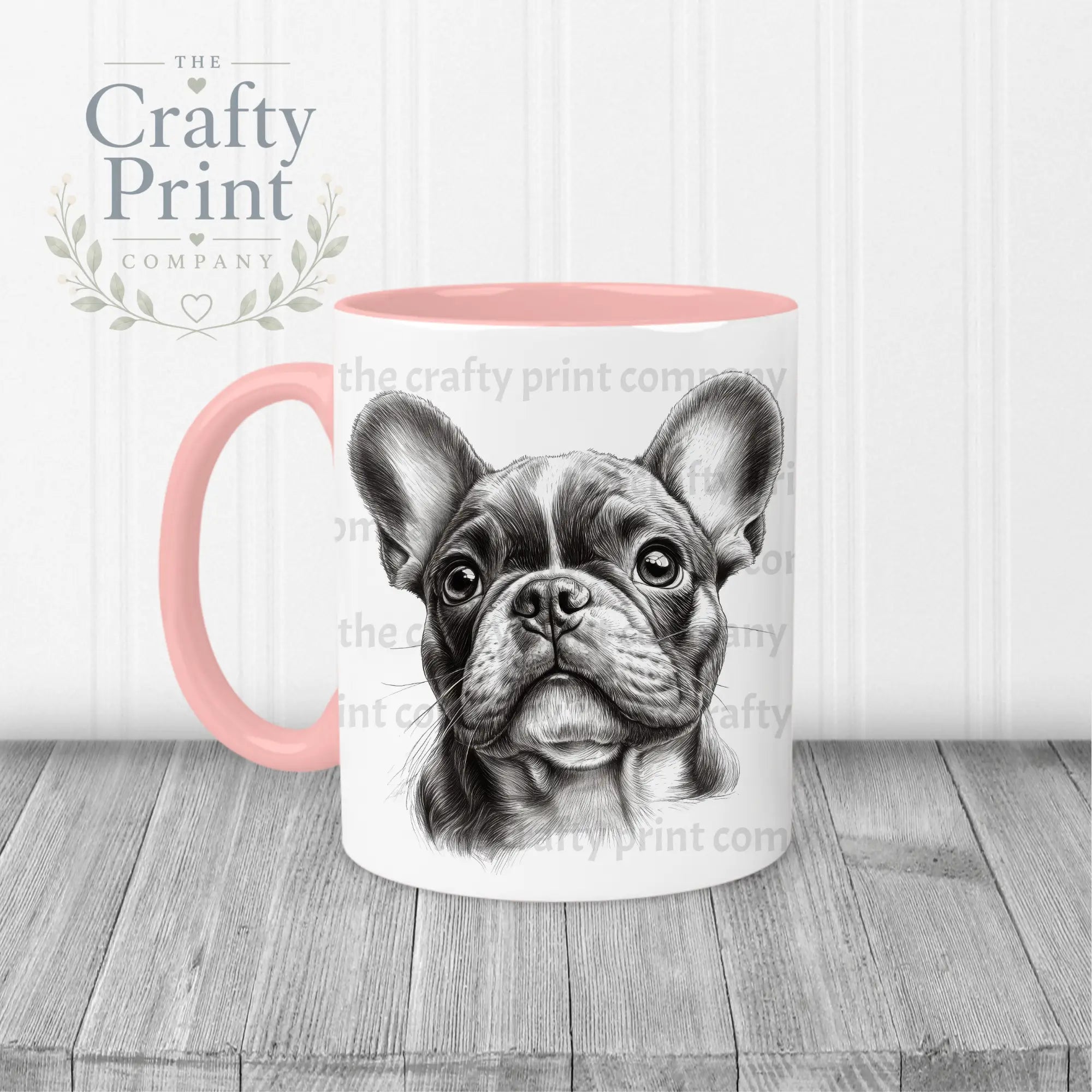 White ceramic french bulldog pencil drawing mug with pink handle and interior featuring detailed french bulldog face
