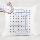 White throw pillow featuring a personalised word search design with highlighted words in orange and blue outlines