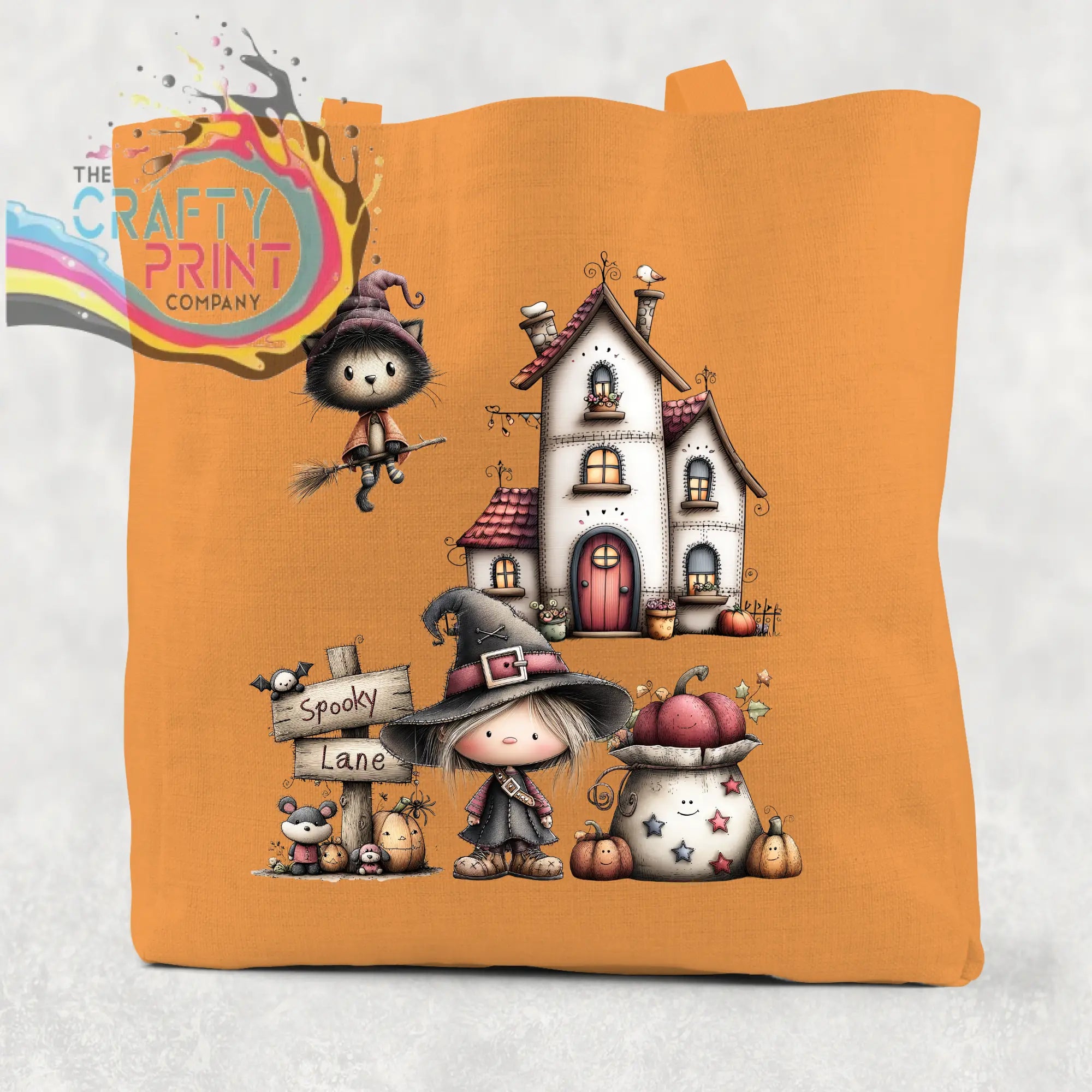 Orange cotton re-usable tote bag featuring spooky lane halloween witch cat and haunted house illustration