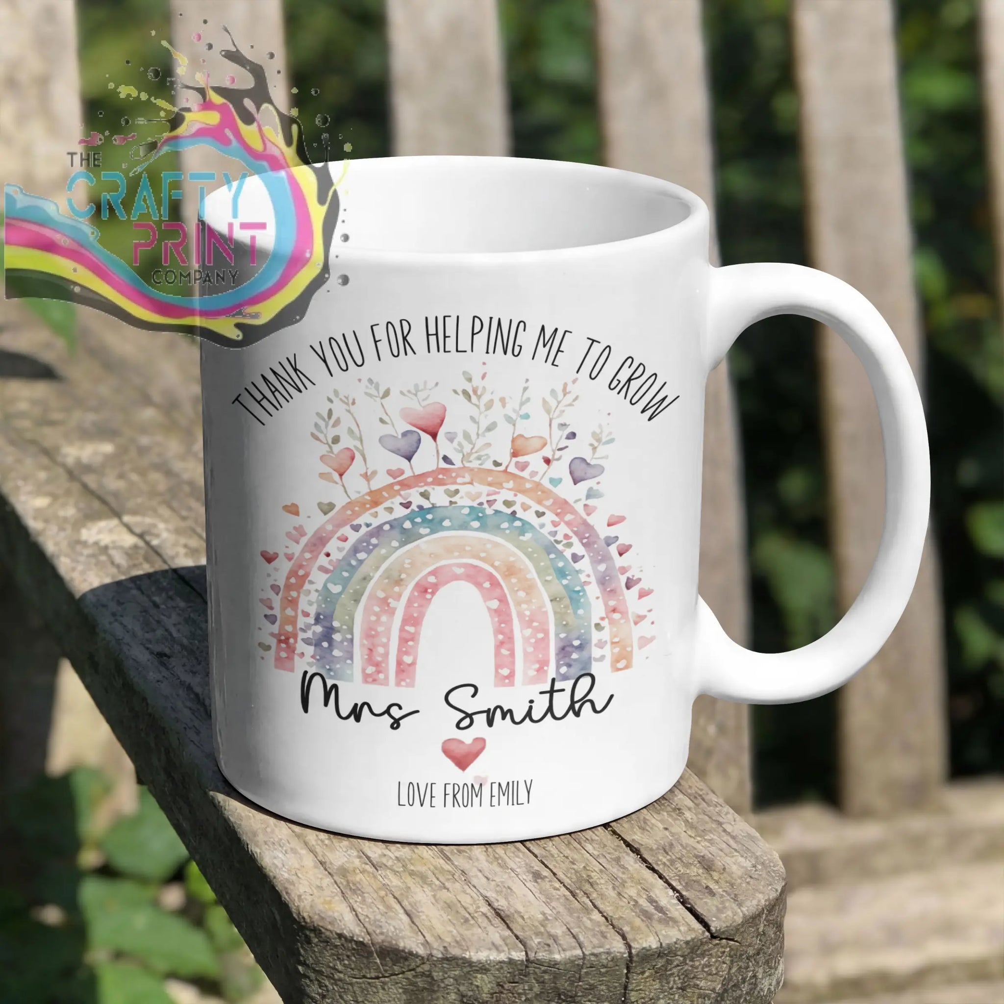 White ceramic grow mug with colorful watercolor rainbow and hearts personalized for teacher gifts and grow teacher mug