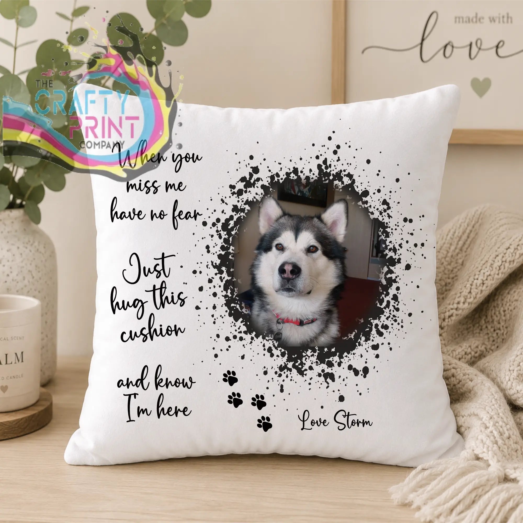 White pet memorial cushion cover with black-and-white Alaskan Malamute photo, sentimental text, and paw prints design