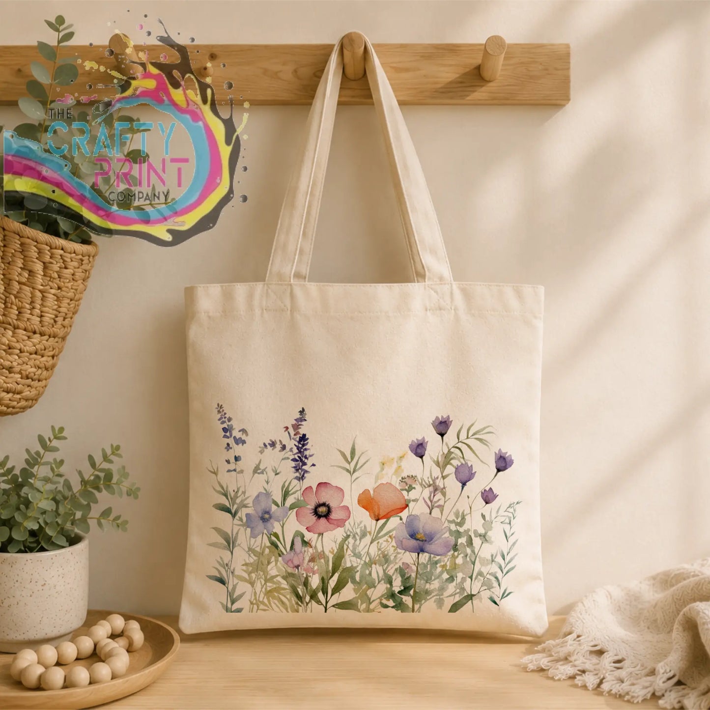 Beige canvas re-usable tote bag with delicate purple pink and orange watercolor floral design wildflower tote bag